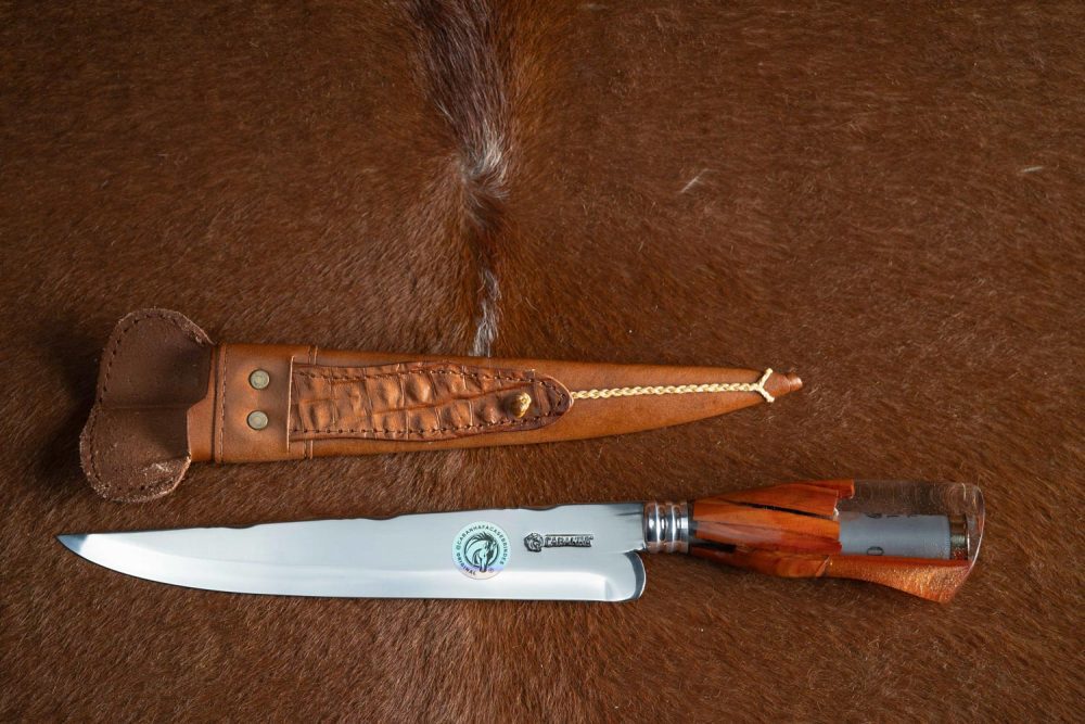 FACA COM CAPSULAS CAL.12